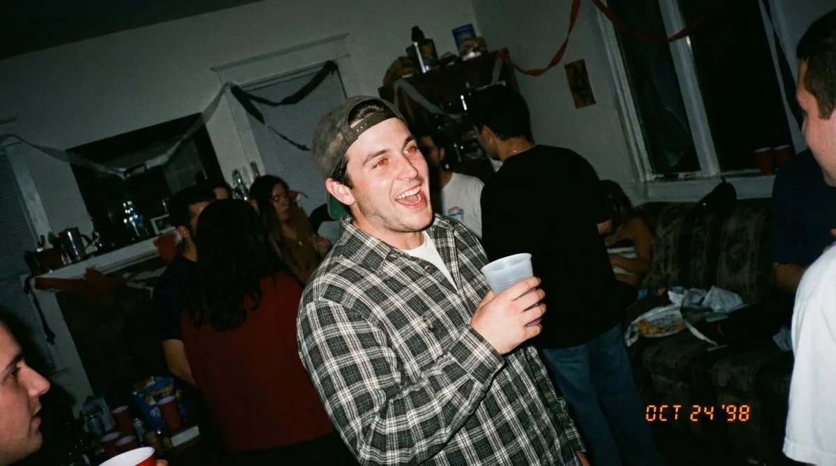 Candid 90s Party Photo | Young Man Laughing, Red-Eye - Vintage, Retro - AI Generated Image