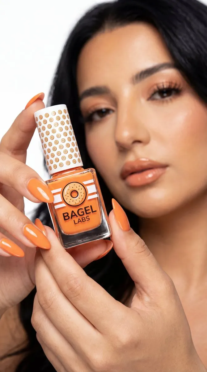Vibrant Orange Nail Polish by Bagel Labs - Beauty Product - Product, Photography - AI Generated Image