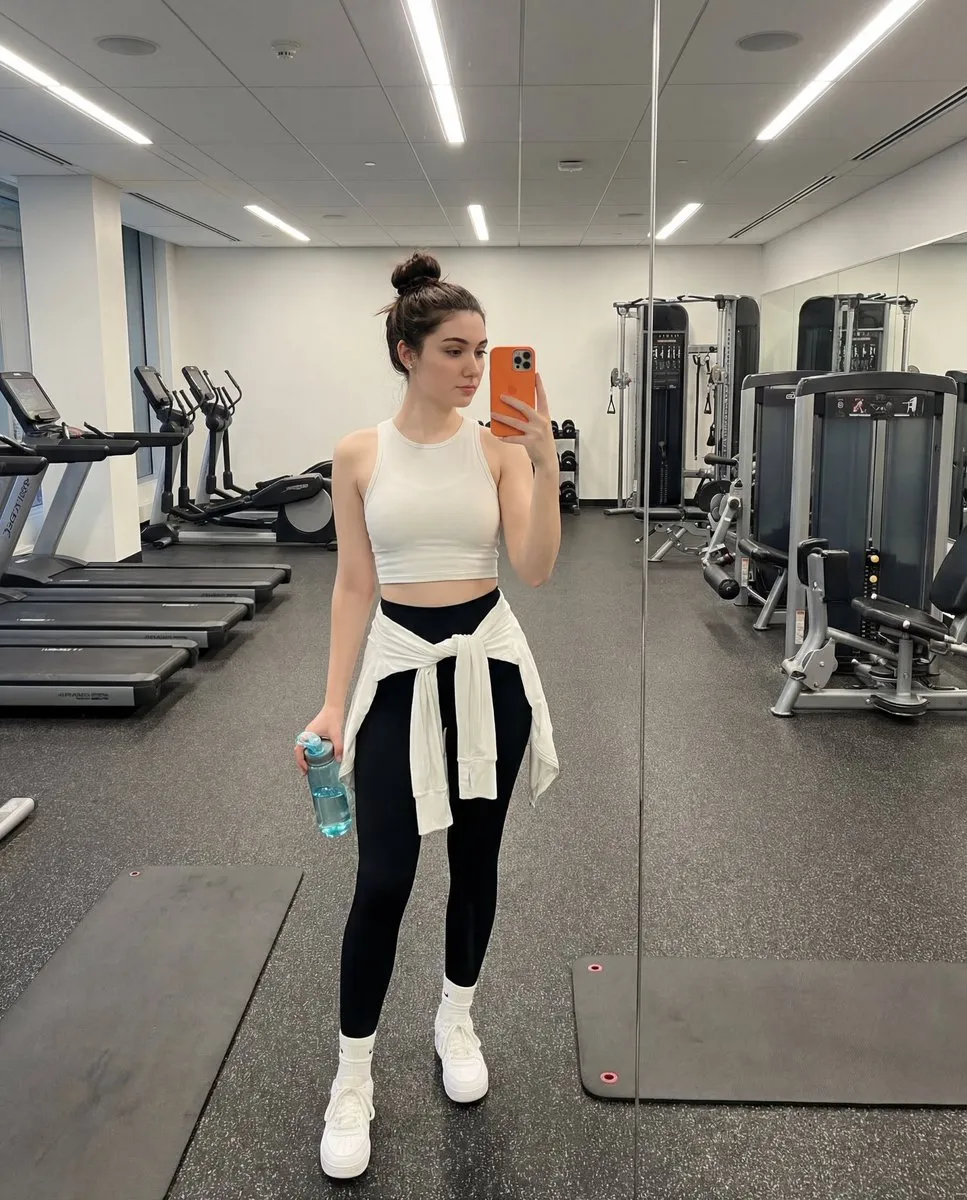 Woman's Gym Selfie: Fitness Fashion & Workout Style - Sports, Action - AI Generated Image